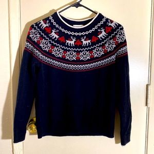 Cute holiday sweater. You can dress up or down. Perfect for the office or dinner